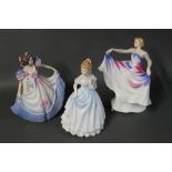 Three Royal Doulton figurines "Liberty" "Clare" and "Angela"
