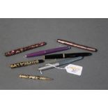 Morrrisons fountain pen marked 14 KT, propelling pencil and five pens (Parker Maxima,