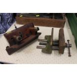 Bench vice and moulding plane with brass fittings