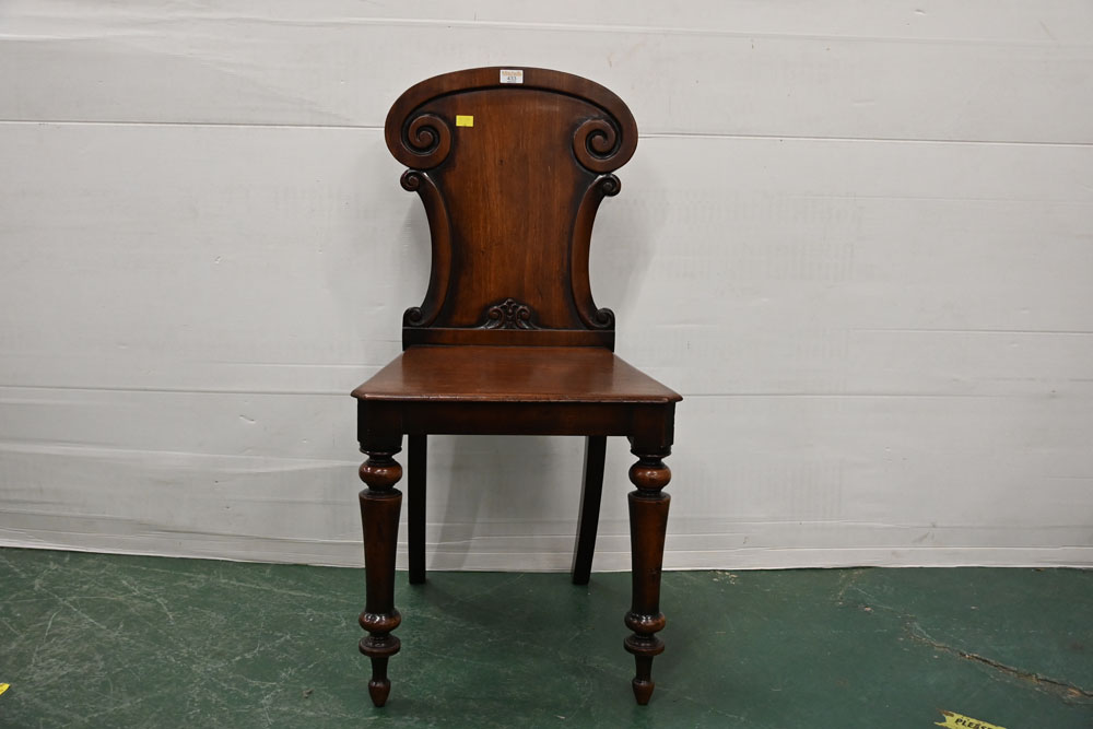 Victorian mahogany hall chair with carved back and turned legs, height 87 cm,