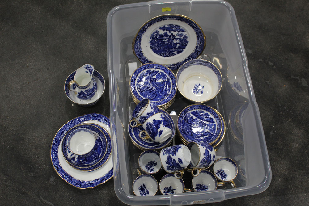 Late 19th/early 20th century blue and white Willow pattern tea service with gilded edges