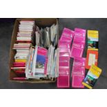 Box of maps and tourist guides