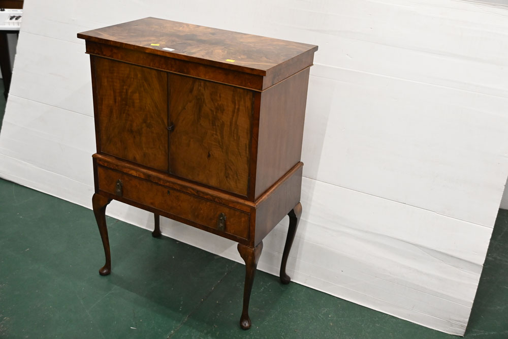 Walnut cocktail cabinet with drop handles