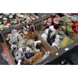 Two boxes of figurines, statues, Staffordshire style cats,
