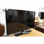 Samsung flat screen TV +/- 44" with remote control