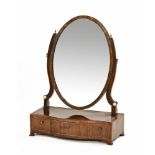 A 19th century inlaid mahogany serpentine fronted dressing table mirror, with oval glass.