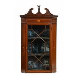 A 19th century inlaid mahogany hanging corner cupboard,