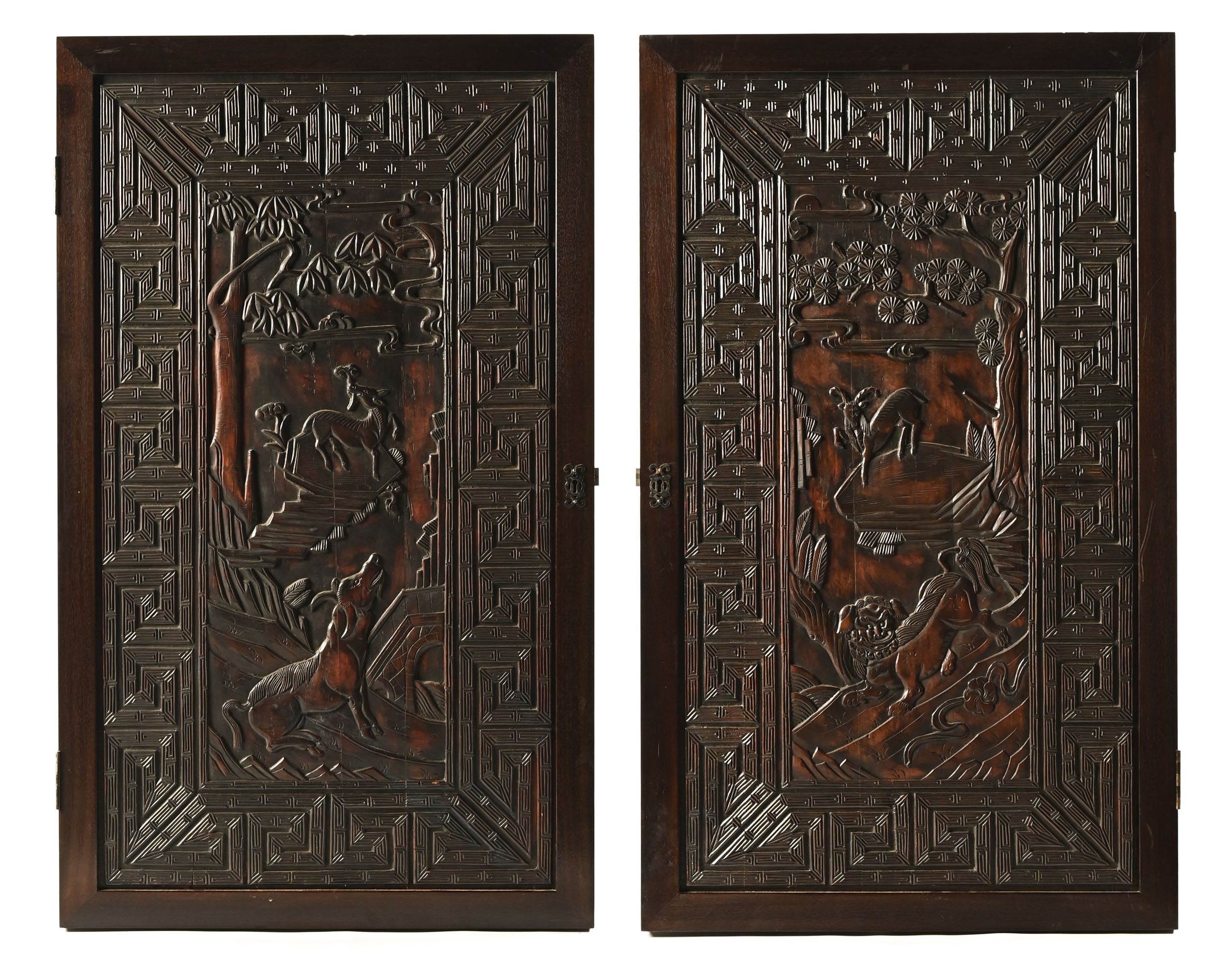 Two large antique Chinese carved wooden panels,