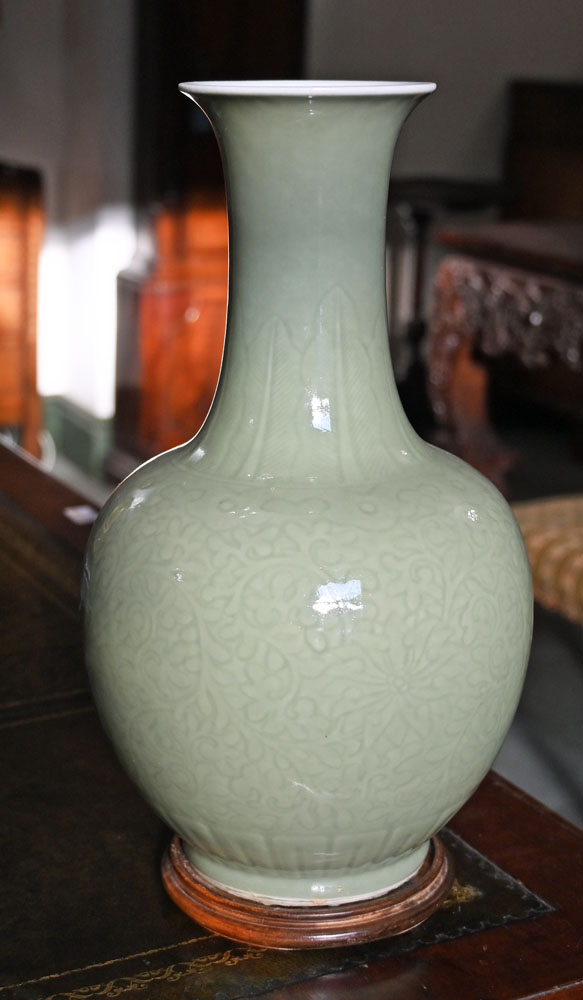 A Chinese celadon vase, with integral circular wooden stand. Height 38 cm. - Image 4 of 6