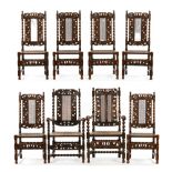 A matched set of two arm and six single oak cane backed and seated Jacobean style dining chairs.