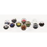 A collection of Caithness paperweights, to include the designs Pluto, Moon and Jubilee Crown Bubble,