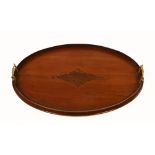 An Edwardian inlaid mahogany oval tray, with brass carrying handles. Length 59 cm.