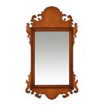 A large Chippendale style fretwork wall mirror, with bevelled glass. Height 106 cm, width 60 cm.