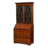 An Edwardian inlaid mahogany bureau bookcase,