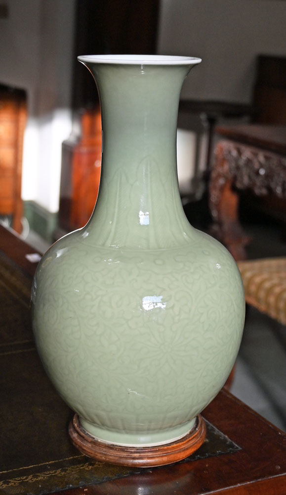 A Chinese celadon vase, with integral circular wooden stand. Height 38 cm. - Image 3 of 6