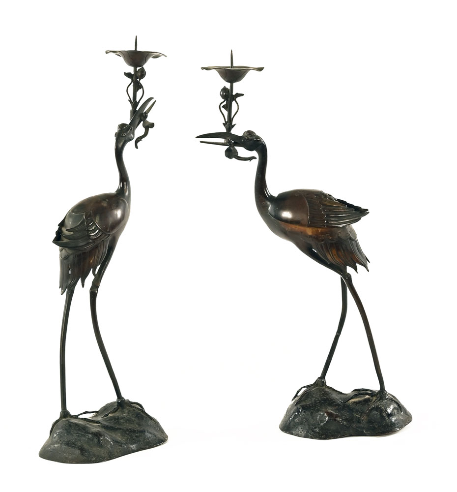 A pair of Japanese bronze crane candle holders. Height 62 cm.