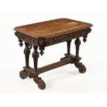 A late Victorian carved oak centre table,