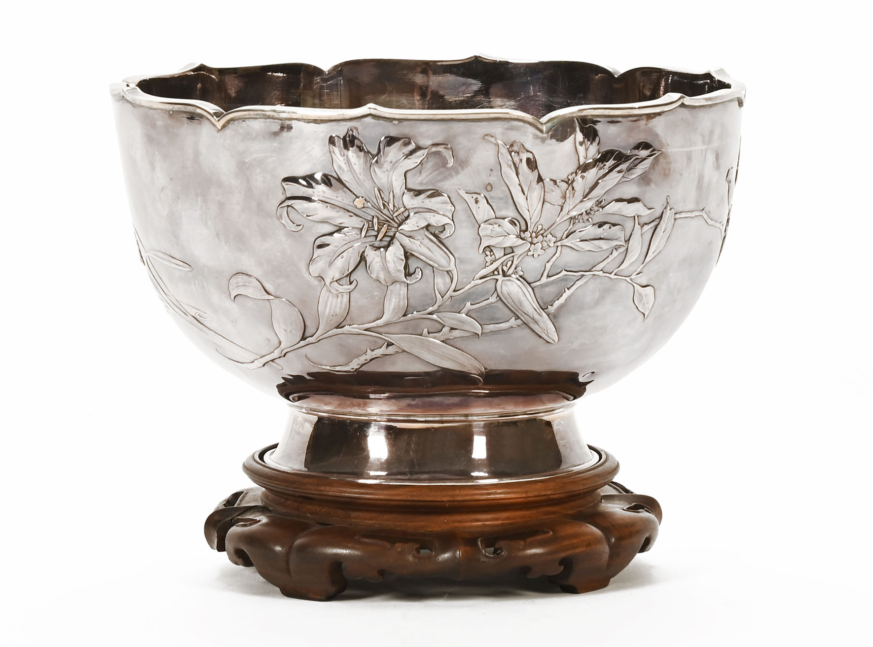 A late 19th/early 20th century Chinese white metal double walled circular bowl,