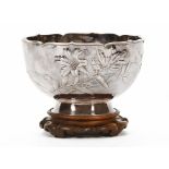 A late 19th/early 20th century Chinese white metal double walled circular bowl,