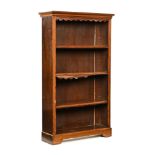 An Edwardian inlaid mahogany open bookcase, with moulded edge above a tooled leather frieze,