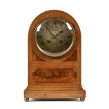 An Edwardian inlaid mahogany mantle clock,