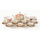 A 19th century chinoiserie ware tea service, comprising teapot and stand, 7 cups, 8 saucers,