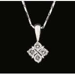 An 18 ct white gold pendant on chain, set with diamonds weighing +/- .34 carats.