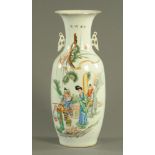A large Chinese vase, decorated with figures and character marks. Height 58 cm.