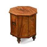 A 19th century octagonal mahogany wine cooler, with fitted interior and raised on turned legs.