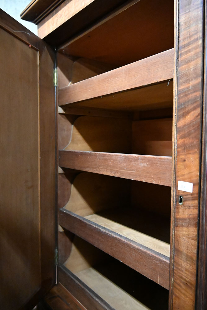 A William IV mahogany linen press with moulded cornice above a pair of panelled doors opening to - Image 4 of 12