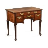 A Georgian mahogany lowboy,