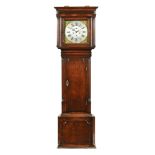 A George III oak longcase clock, with eight day striking movement by Gaskell Knutsford.