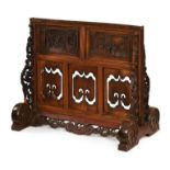 A large Chinese carved hardwood floor screen stand.