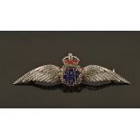 An 18 ct and 15 ct gold enamelled RAF brooch, 8.5 grams. Length 58 mm (see illustration).