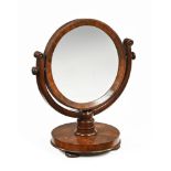 An early Victorian mahogany framed circular dressing table mirror,
