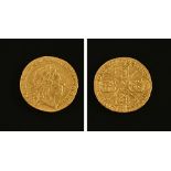 A George I half guinea 1724, crowned cruciform shields, sceptres in angles. 4.1 grams.