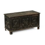 A late 19th/early 20th century carved oak blanket box,