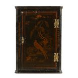 A 19th century chinoiserie lacquered hanging corner cupboard,