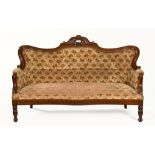 A Victorian mahogany framed settee,