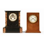 A Victorian black slate and marble mantle clock,