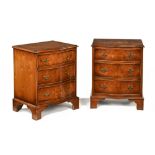 A pair of walnut bedside chests,