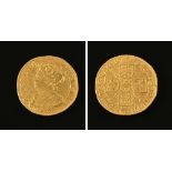 A Queen Anne guinea 1713, third Laureate and draped bust, cruciform shields, sceptres in angles,
