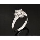 An 18 ct white gold daisy cluster ring, set with diamonds weighing +/- 1.03 carats. Size N/O.