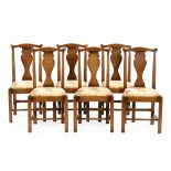 A set of six George III style splat back dining chairs,