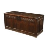 A large 18th century oak coffer,