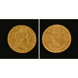 A George I guinea 1715, crowned cruciform shields, sceptres in angles. 8.3 grams.