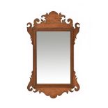 A 19th century mahogany fretwork mirror. Height 49 cm, width 30 cm.