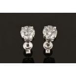 A pair of 18 ct white gold stud earrings, set with diamonds weighing +/- 2.13 carats.