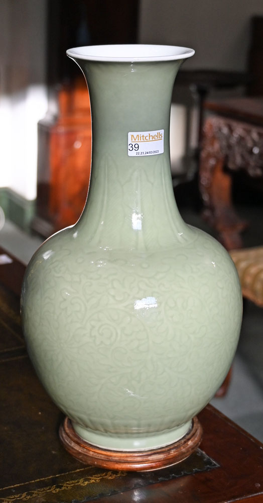 A Chinese celadon vase, with integral circular wooden stand. Height 38 cm. - Image 2 of 6