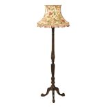 An Edwardian mahogany lamp standard,